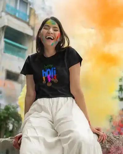 Celebrate Joyfully: Women's Colorful Happy Holi T-Shirt in Vivid Splashes | 100% Premium Bio Wash Cotton T-Shirts - S  (Black)