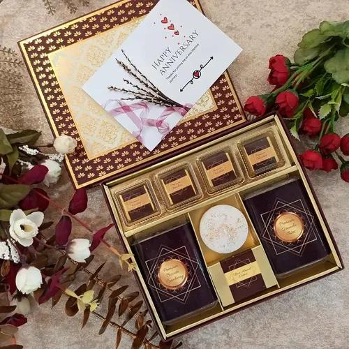 Nutrisnacksbox Anniversary Gift Hamper With Chocolates, Cranberry Biscotti, Choco Almond Nutties, Granola Bites, Truffles, Candle & Greeting Card | Anniversary Gift For Wife, Girlfriend, Relatives & Friends